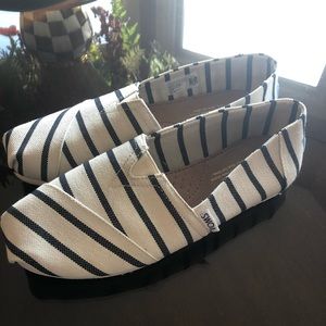 Brand new Toms size 7.5
